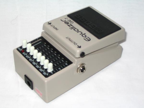 Boss GE-7 Equalizer pedal at an angle, showing the slider bank and input jack